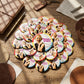 Mellow Monkey 1.25 inch round pin-back buttons featuring a parody design of a character holding a ring