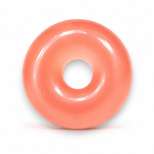 Mellow Monkey FEELZiES peach jelly donut squishy wearable sensory fidget toy with a smooth, soft, and stretchy texture.