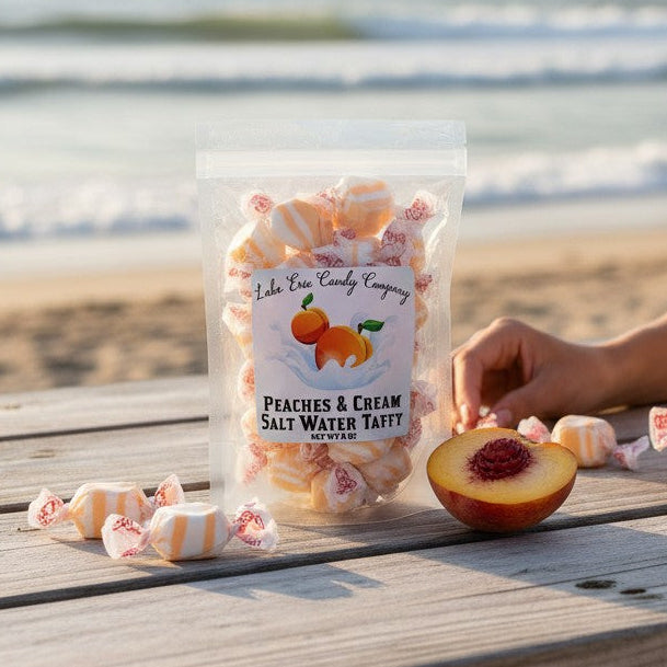 Mellow Monkey Peaches & Cream Salt Water Taffy, 6 oz bag. Individually wrapped candies with white and orange swirls.