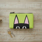 Mellow Monkey Peeking Kitty zip pouch in lime green with black cat face design. Textured PU exterior.