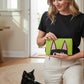 Mellow Monkey Peeking Kitty zip pouch with black cat face on lime green background. Textured PU exterior.