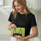 Mellow Monkey Peeking Kitty zip pouch in lime green with black cat face design. Textured PU exterior.