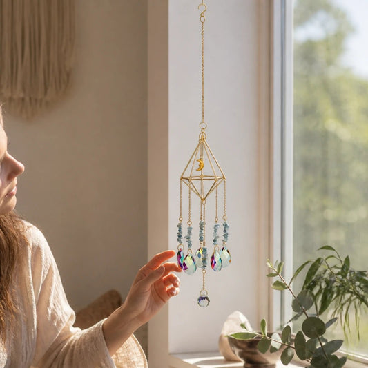 Mellow Monkey pentagon daydream ornament suncatcher with healing stones, gold chains, and light-reflecting crystals.