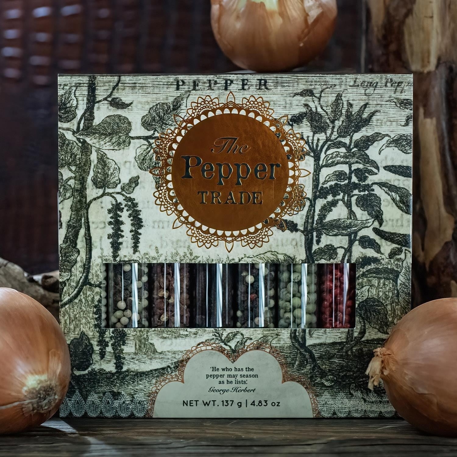 Mellow Monkey The Pepper Trade 8-tube gourmet peppercorn gift set with Vietnamese Black, Indian Green, Brazilian Pink, Chinese Szechuan, and Sarawak White.