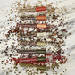 Mellow Monkey The Pepper Trade 8-tube gourmet peppercorn gift set with Sarawak White, Tropical Blend, Chinese Szechuan, Lemon Pepper, Rainbow Blend, Vietnamese Black, Brazilian Pink, and Indian Green.