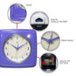 Mellow Monkey periwinkle retro square wall clock with cream face and purple metal hands. Easy to hang and set.