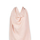 Mellow Monkey Petal nursing cover in soft pink organic cotton muslin with a breathable, textured fabric design.
