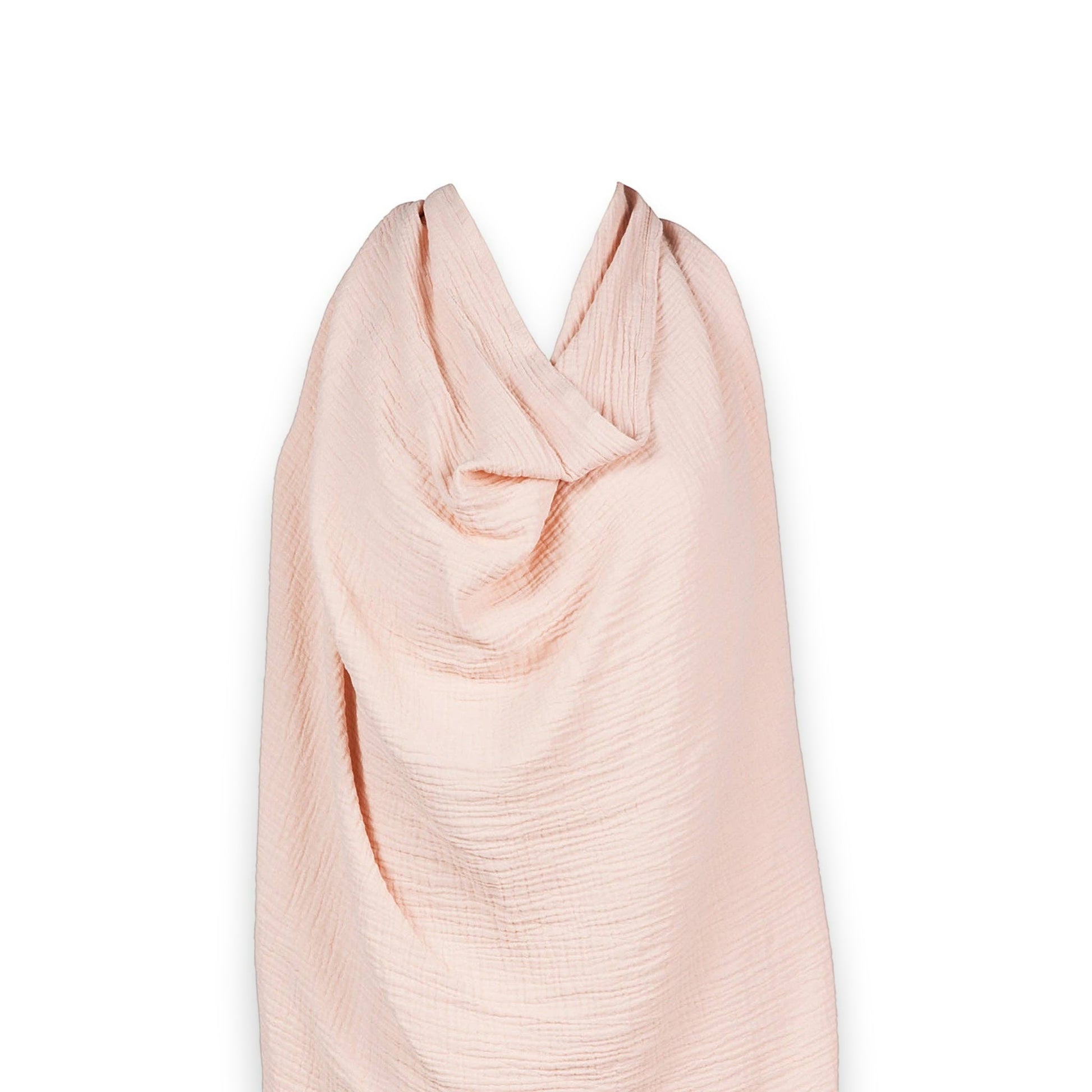 Mellow Monkey Petal nursing cover in soft pink organic cotton muslin with a breathable, textured fabric design.