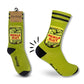 Mellow Monkey Pickle Slut novelty socks in pale green with a pickle jar graphic and funny text on a retail card.