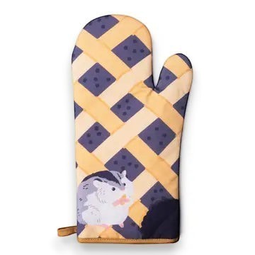 Mellow Monkey Kinda Wanna Eat Pie oven mitt with heat-resistant padding and hanging loop, featuring a hamster eating pie.