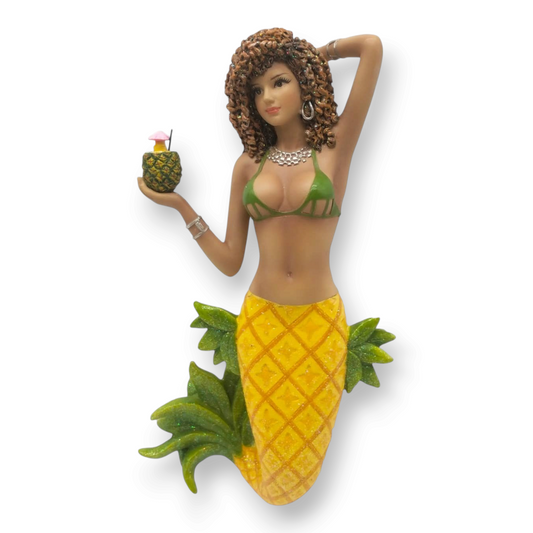 Mellow Monkey December Diamonds Pina mermaid ornament with a pineapple tail, green bikini, and tropical drink.