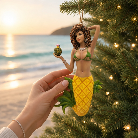 Mellow Monkey December Diamonds Pina mermaid ornament with pineapple tail and tropical drink on a Christmas tree