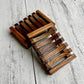 Mellow Monkey natural pine wood soap dish with self-draining slats. Dark wood finish.