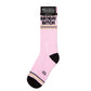 Mellow Monkey pink mid-calf gym socks featuring Birthday Bitch text and black and gold striped accents