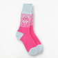 Mellow Monkey pink and blue confetti holiday crew socks with a festive snowflake pattern and ribbed knit texture.