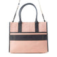 Mellow Monkey pink canvas tote bag with genuine leather handles, front pocket, and contrast stitching.