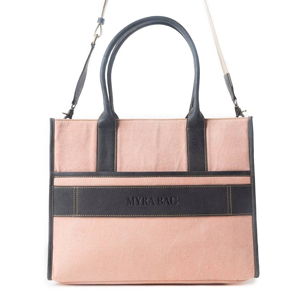 Mellow Monkey pink canvas tote bag with genuine leather handles, front pocket, and contrast stitching.