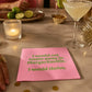 Mellow Monkey pink cocktail napkin with green text reading I would not waste away in Margaritaville. I would thrive.