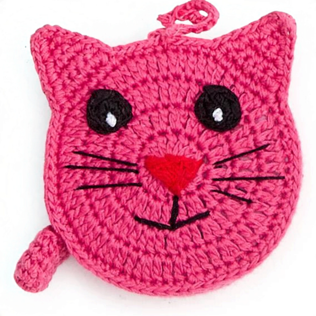 Mellow Monkey pink hand-crocheted kitty cat measuring tape with black eyes and whiskers