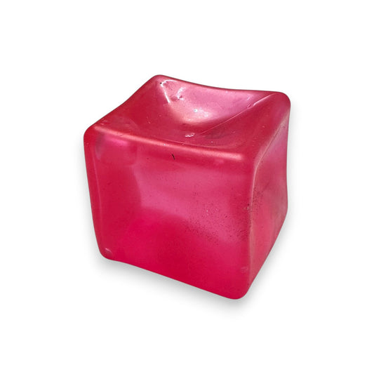 Mellow Monkey 2-inch pink glittery crystal squish cube for stress relief and sensory fidget play.