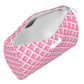 Mellow Monkey Garden Gate Packin' Heat toiletry bag in a pink and white geometric grid pattern with a zip closure.