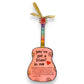 Mellow Monkey pink hand-painted guitar ornament with You've Got A Friend in Me text and gold ribbon hanger