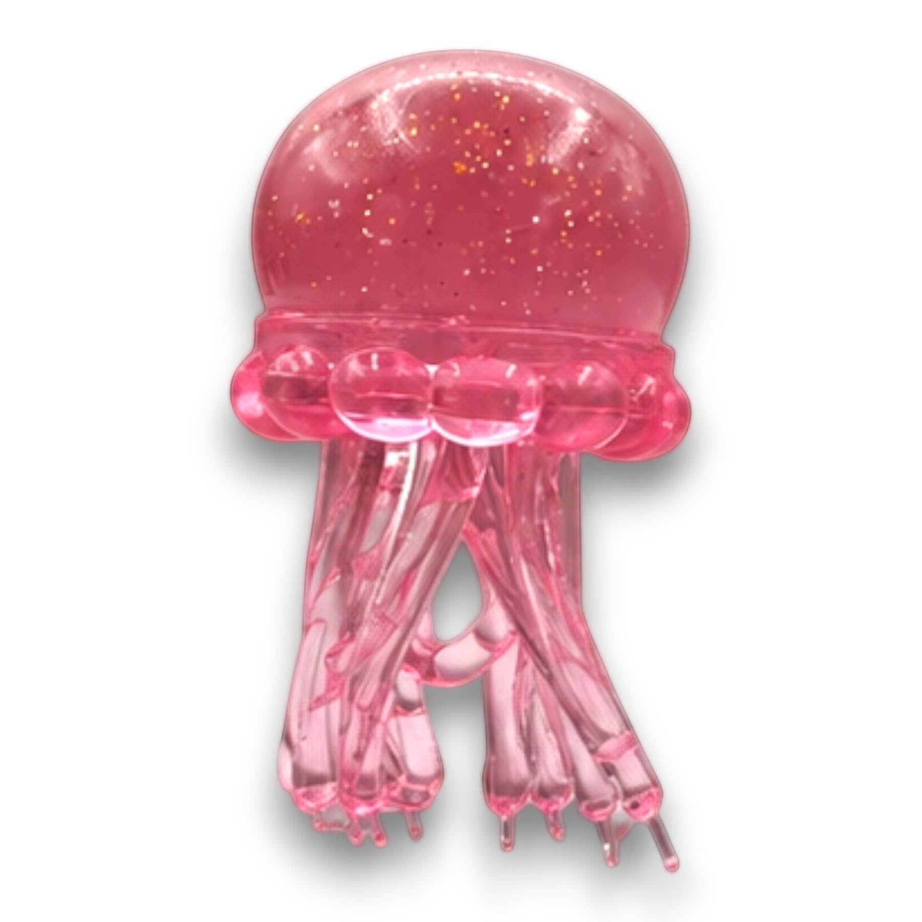 Mellow Monkey pink translucent octopus squish toy with glitter swirl finish for sensory stress relief.