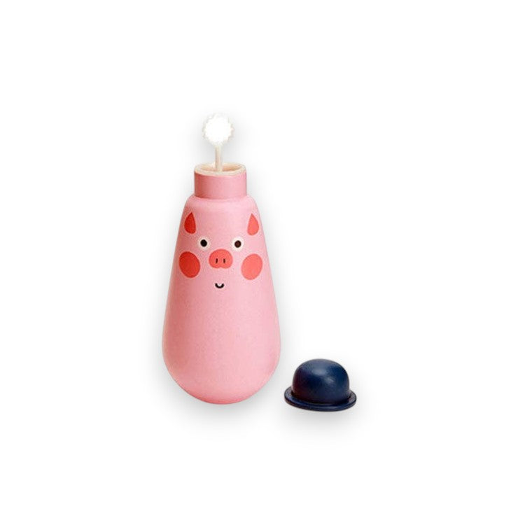 Mellow Monkey Squeezy Bubbles pig-themed bubble wand in pink with a small blue cap for kids outdoor play