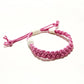 Mellow Monkey pink woven cotton nautical bracelet with adjustable sliding knot closure on a white background