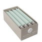 Mellow Monkey 12-piece box of pistachio green 7-inch smokeless and dripless taper candles