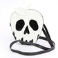 Mellow Monkey glow in the dark poisoned apple crossbody bag in black and white vinyl with a detachable strap.