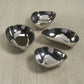 Mellow Monkey polished nickel alloy condiment bowls in four unique organic shapes for dips and sauces.