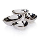 Mellow Monkey set of four polished nickel alloy condiment bowls with unique organic shapes for dips and sauces.