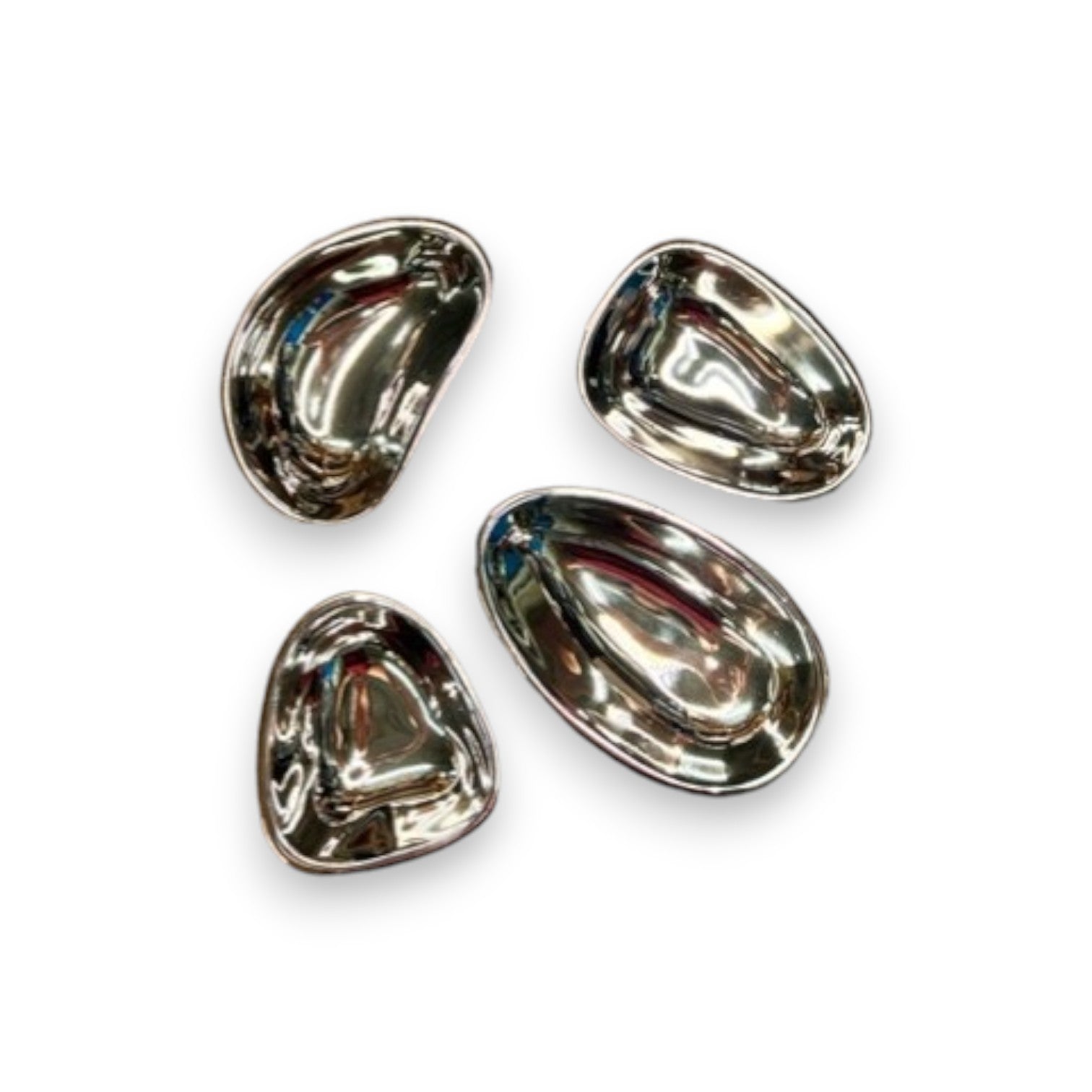 Mellow Monkey set of four polished nickel alloy condiment bowls in unique organic shapes for dips and sauces.