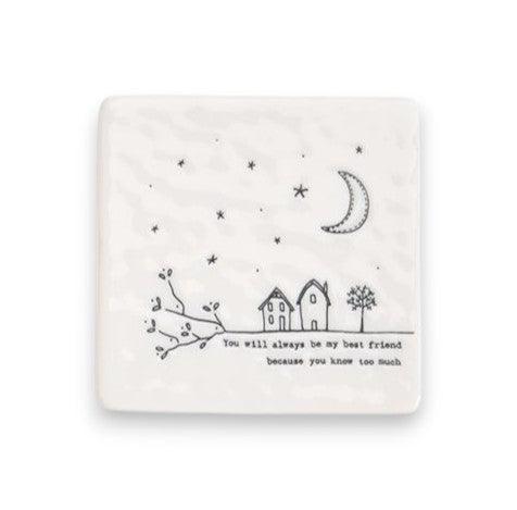 Mellow Monkey square white porcelain coaster featuring a black ink illustration of houses, moon, and best friend quote.