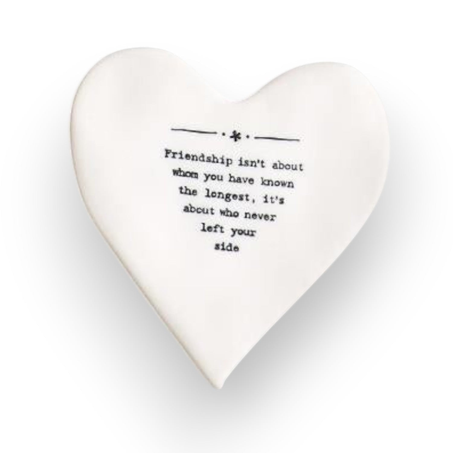 Mellow Monkey white porcelain heart-shaped coaster with black friendship quote text and a protective base.