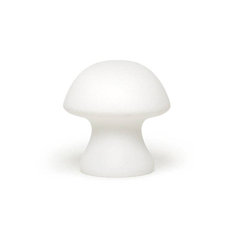 Mellow Monkey small white porcelain mushroom-shaped LED light that emits a soft, diffuse glow.