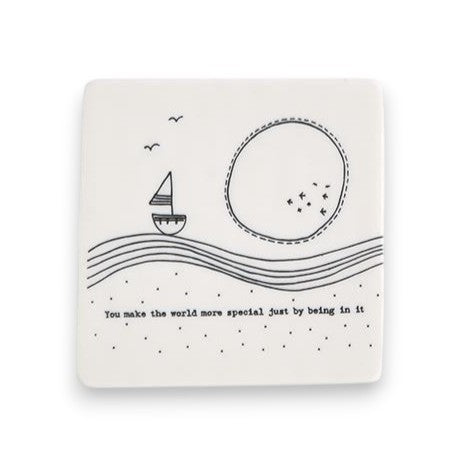 Mellow Monkey square white porcelain coaster with black sailboat illustration and inspirational quote