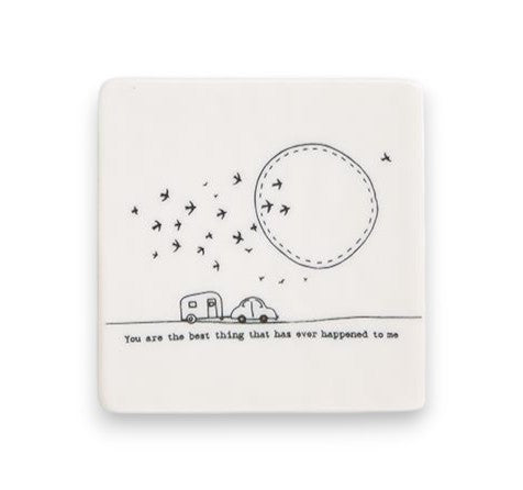 Mellow Monkey white porcelain square coaster with black illustration of a car, caravan, and birds with sentimental text