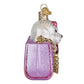 Mellow Monkey Posh Pup In Purse glass holiday ornament. White dog with pink bow in a glittery purple purse with gold chain.