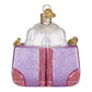 Mellow Monkey Posh Pup In Purse blown glass holiday ornament, 3.25-in. Features a lavender glitter purse with pink accents and a white fluffy dog peeking out.
