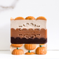 Mellow Monkey Pumpkin Spice vegan handmade bar soap with layered autumn colors and decorative pumpkin embeds.