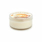 Mellow Monkey Pumpkin Spice Pet House mini candle in a clear glass jar with a decorative label for odor neutralizing.