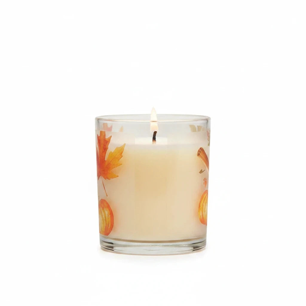 Mellow Monkey Pumpkin Spice pet odor neutralizing candle in a glass jar with autumn leaf and pumpkin print