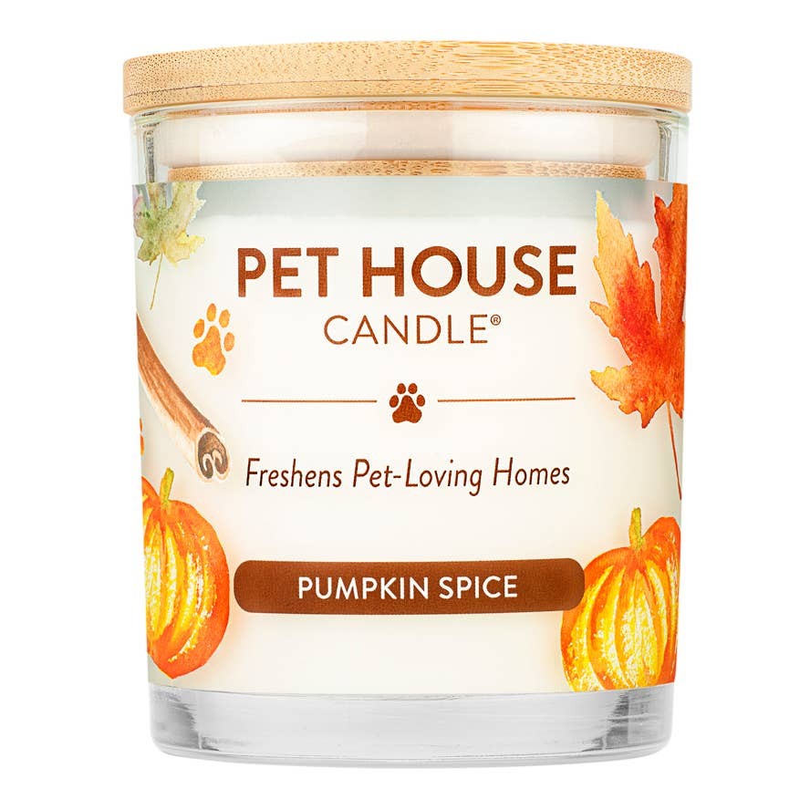 Mellow Monkey Pet House Pumpkin Spice candle in a glass jar with a wooden lid and autumn leaf illustrations.