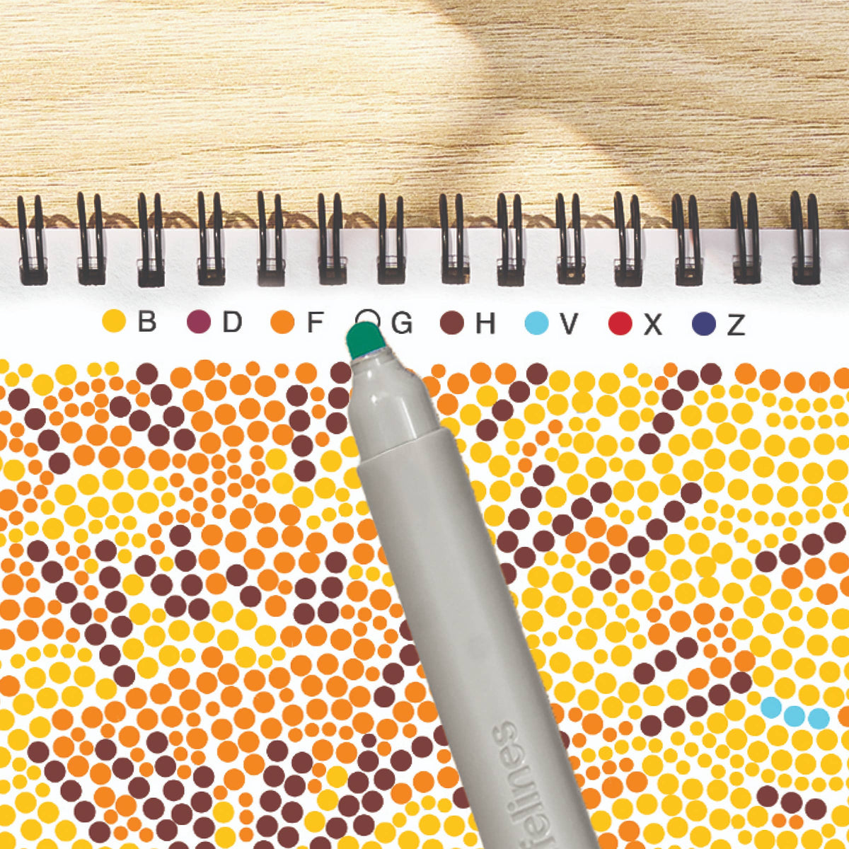 Mellow Monkey Pumpkins & Pastures FlowArt dot-by-letter activity pad with a marker and color-coded letter key.