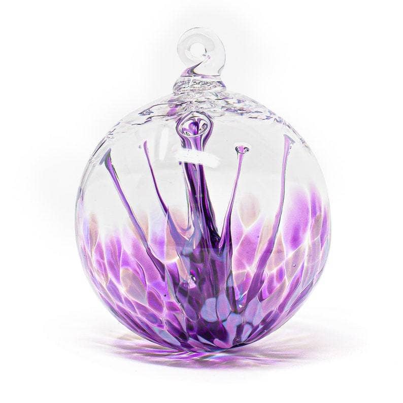 Mellow Monkey 4-inch purple and clear glass wish ball suncatcher ornament with delicate internal swirling patterns.