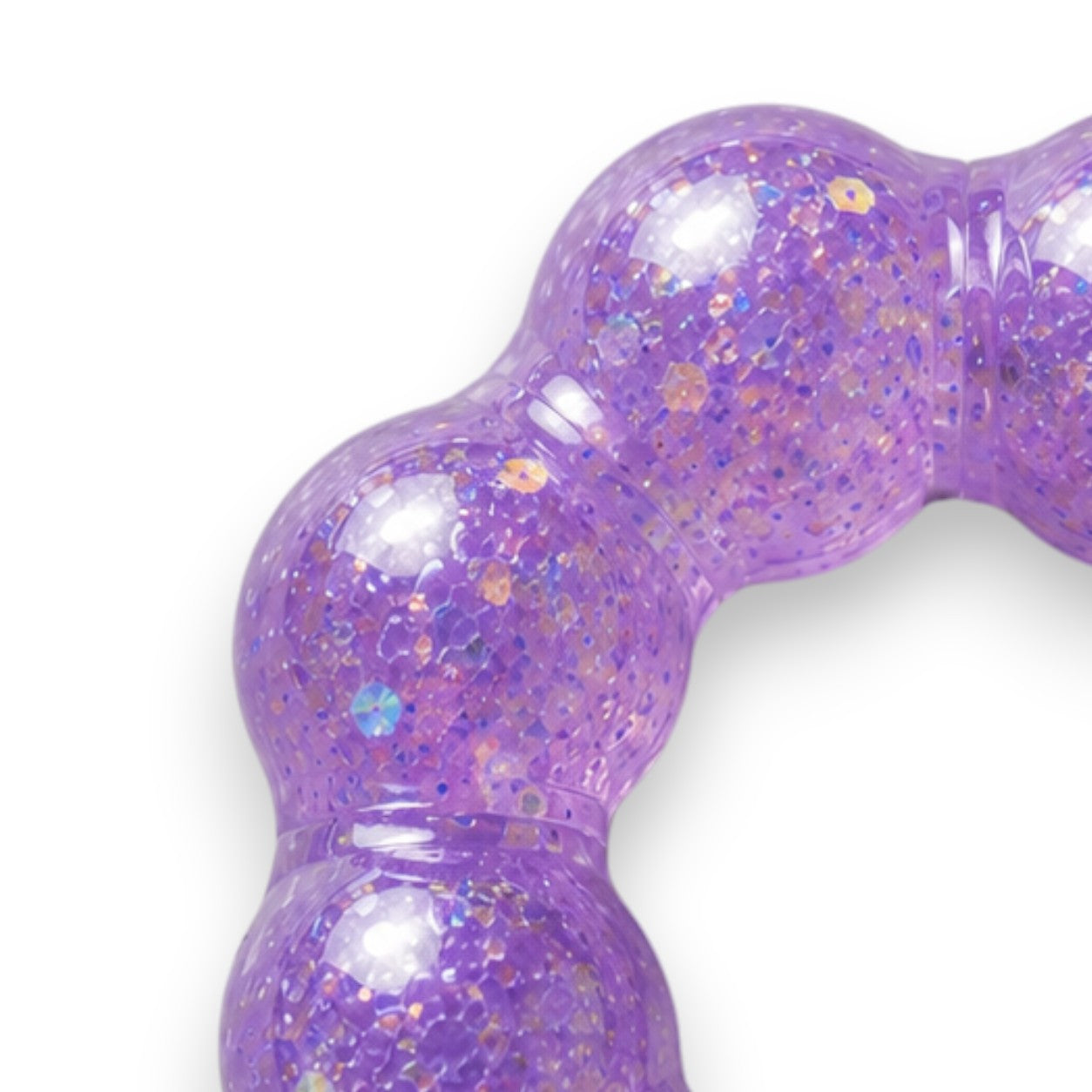 Mellow Monkey Purple Haze Feelzies sensory bracelet with glittery purple squishy texture on a marble surface