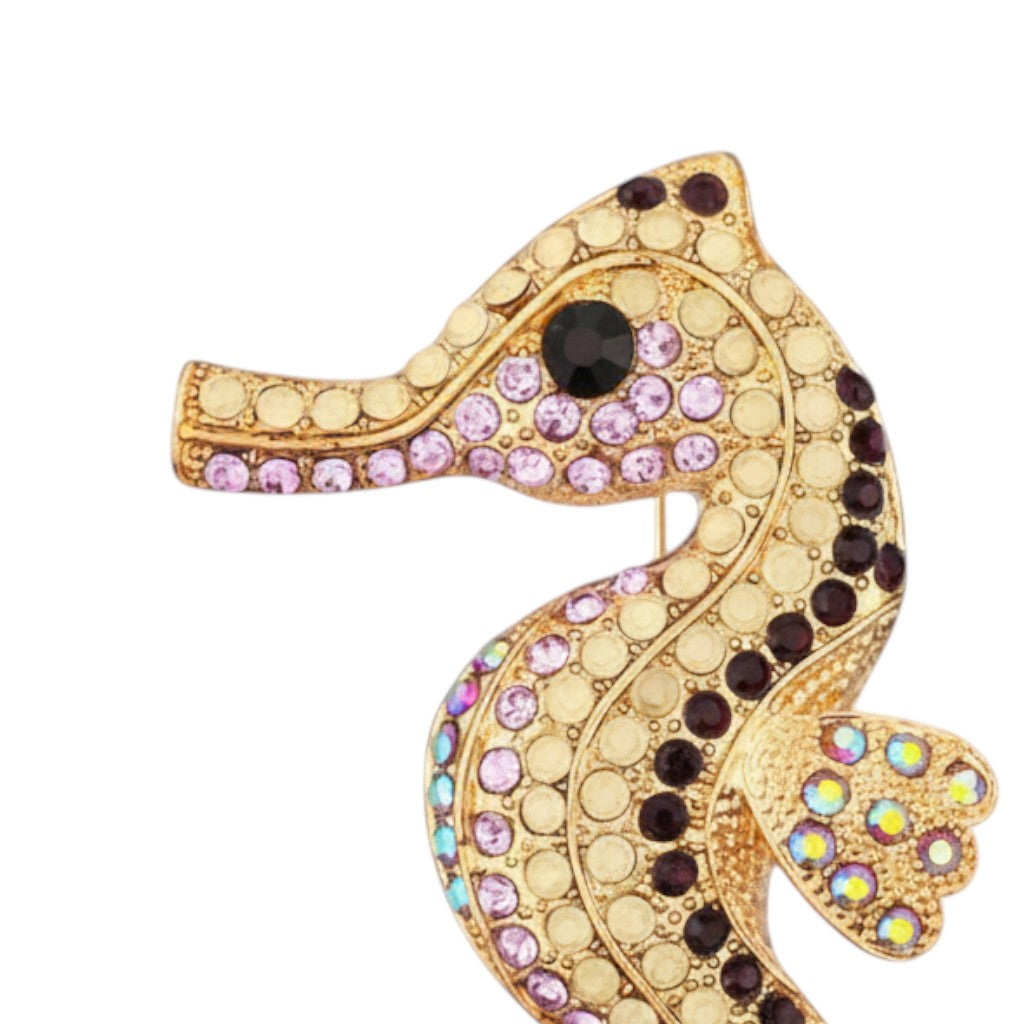 Mellow Monkey gold-tone seahorse brooch pin with purple, clear, and black rhinestones.