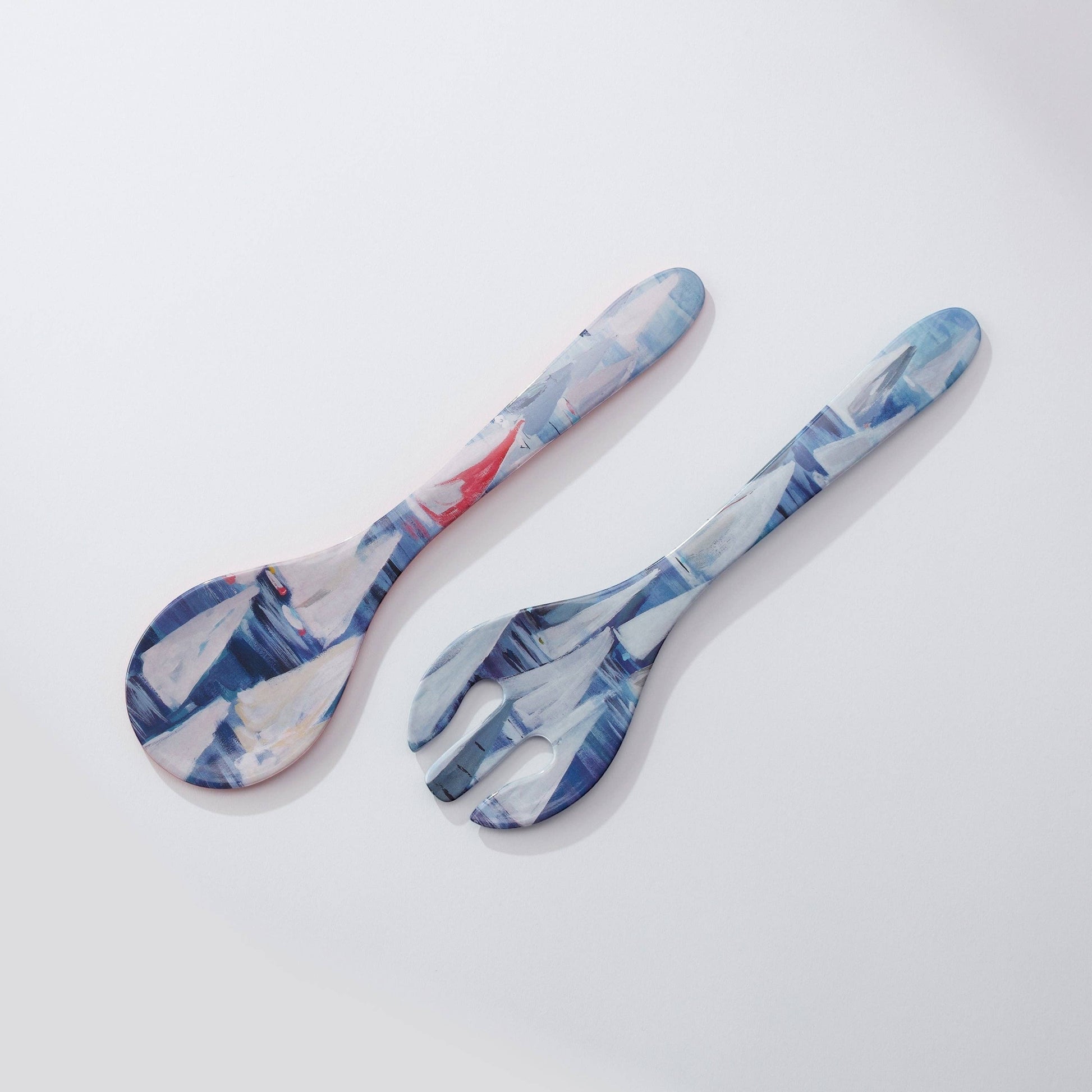 Mellow Monkey Race Day melamine salad utensils featuring Kim Hovell art with blue and white abstract sailing motifs.